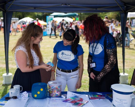 Bucks Mind Stall with volunteers engaging with public