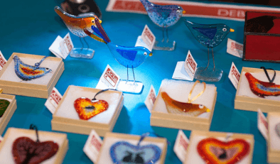 Handmade glass necklaces and birds