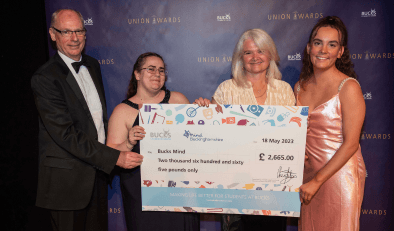 Bucks New University donating giant cheque to Bucks Mind